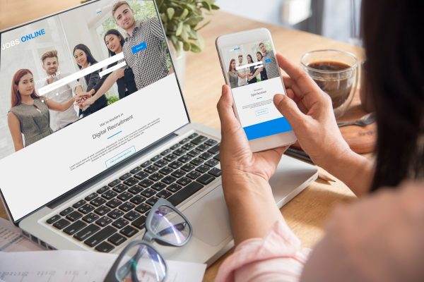 Happiness Asian Woman working from home using laptop online meeting in home office Happiness Asian Woman working from home using laptop online meeting in home office